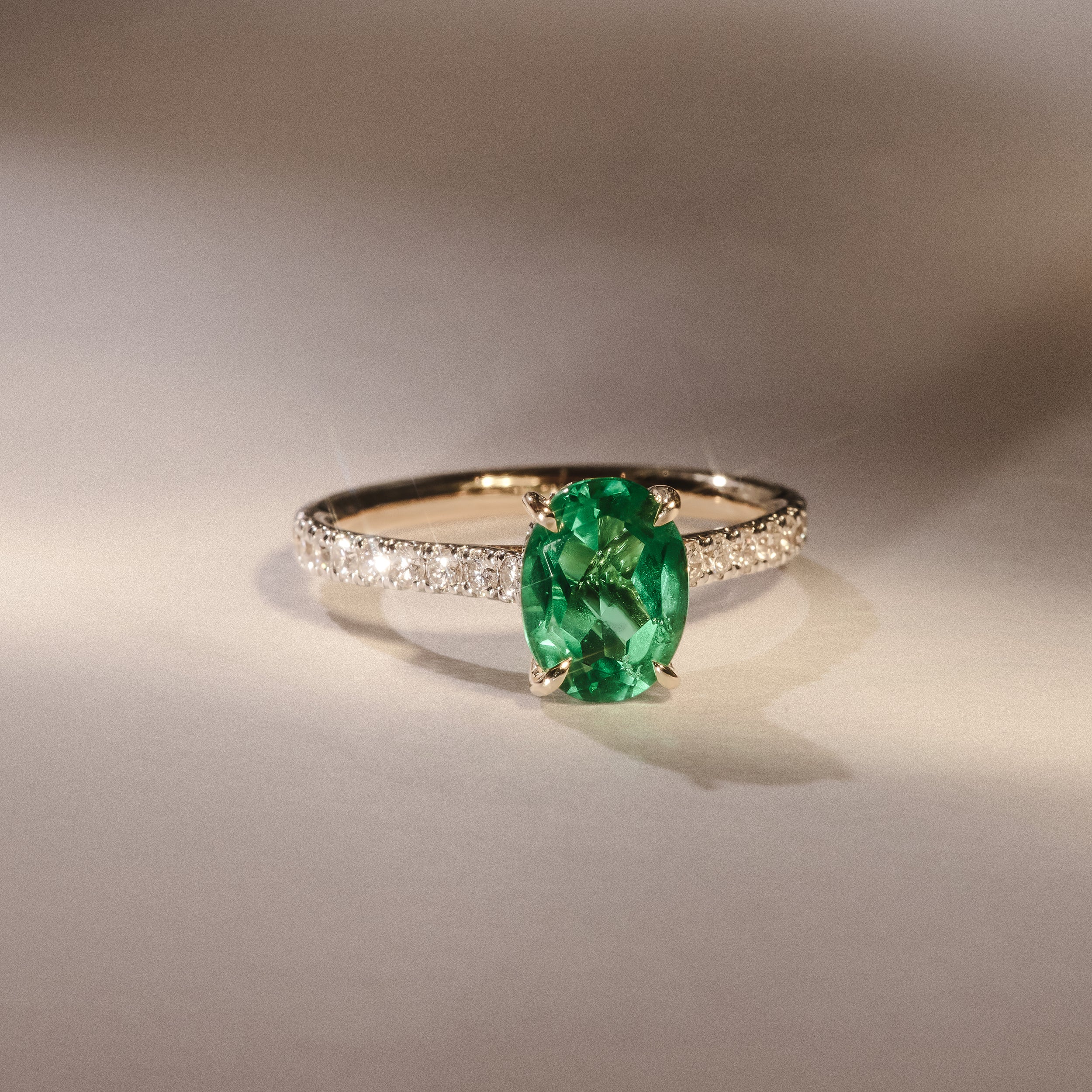 Amora Gem 2.00ct Oval Cut Lab Emerald Hidden Halo Engagement Ring with Side Stones in 18K Yellow Gold - Image 4