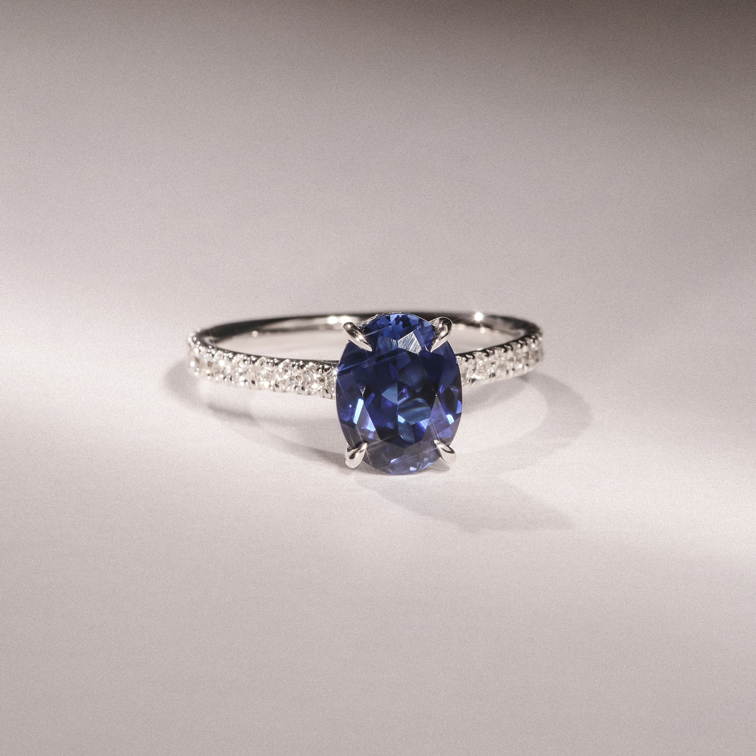 Amora Gem 2.00ct Oval Cut Lab Sapphire Hidden Halo Engagement Ring with Side Stones in 18K White Gold - Image 6