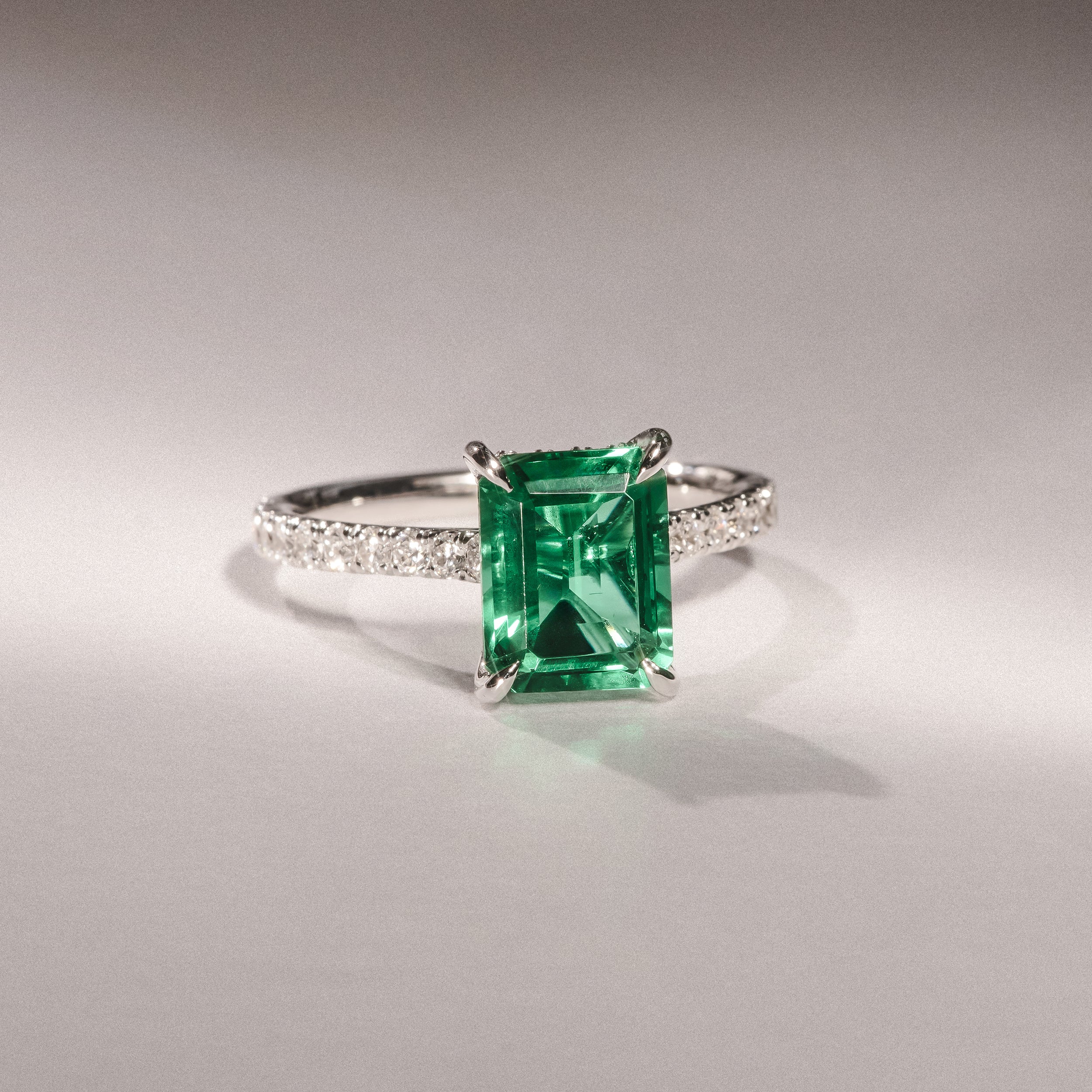 Amora Gem 2.50ct Emerald Cut Lab Emerald Hidden Halo Engagement Ring with Side Stones in 18K White Gold - Image 6