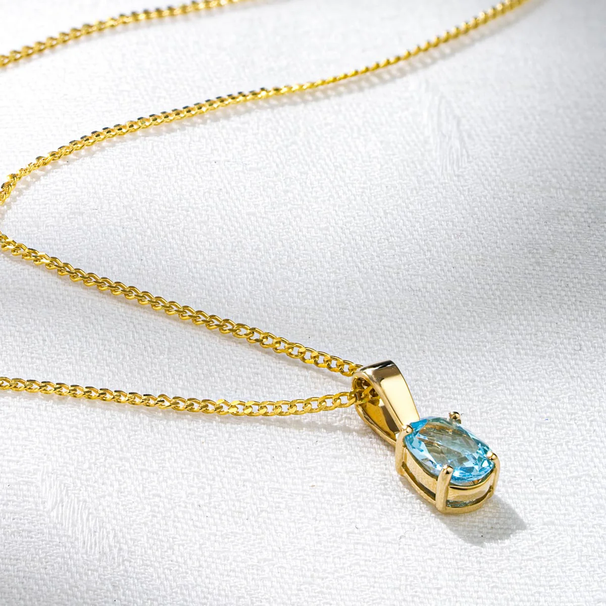 Blue Topaz 7 x 5mm 9K Yellow Gold Pendant Necklace - Image 5
