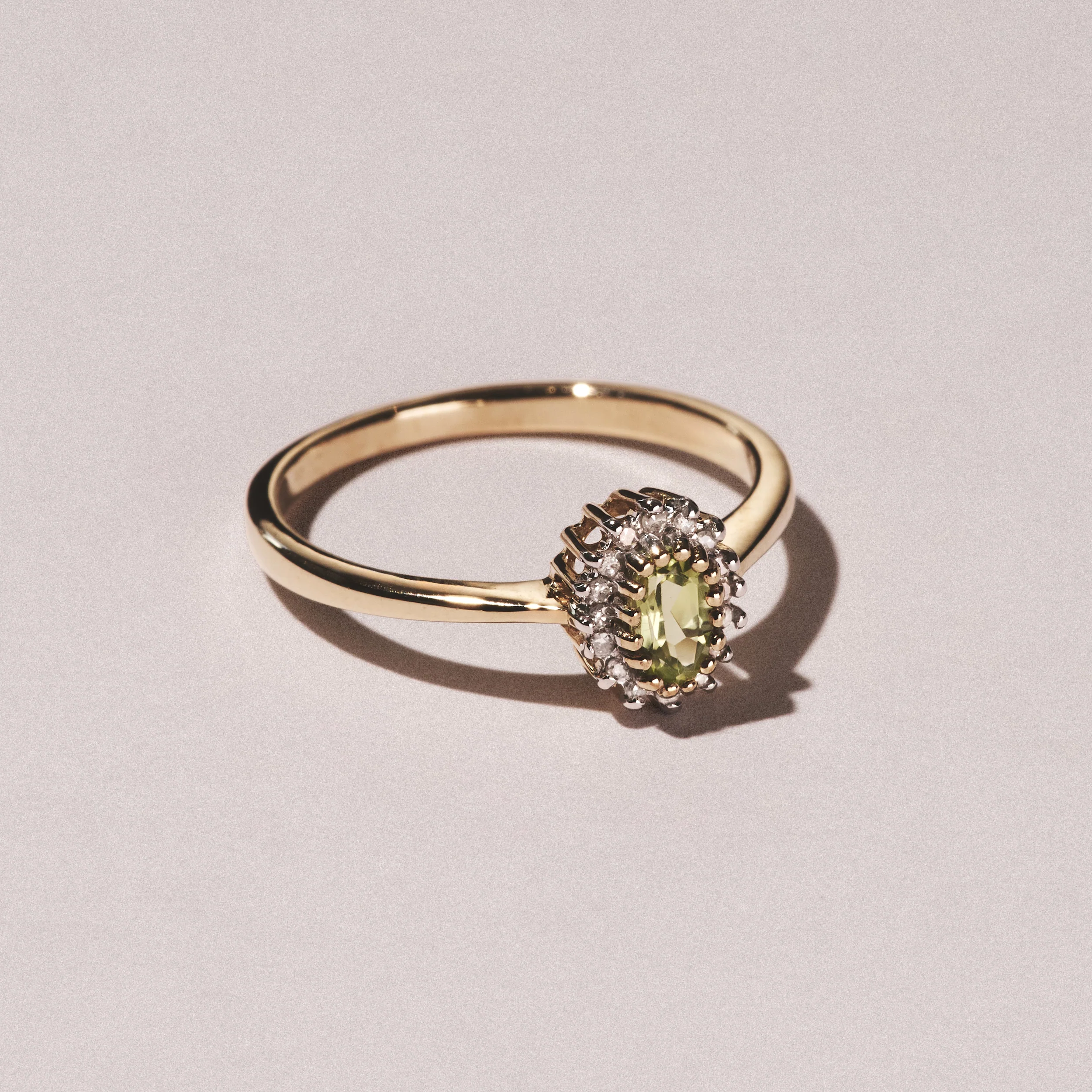 Peridot 6 x 4mm And Diamond 9K Yellow Gold Ring - Image 2