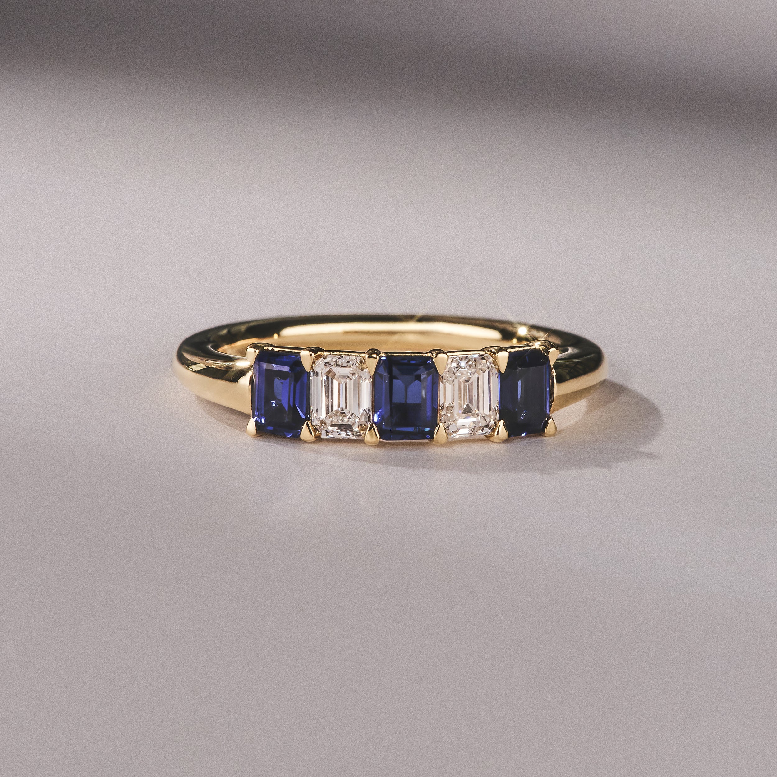 Solene 0.75ct Emerald Cut Lab Sapphire and Lab Diamond Half Band Eternity Ring in 18K Yellow Gold - Image 6