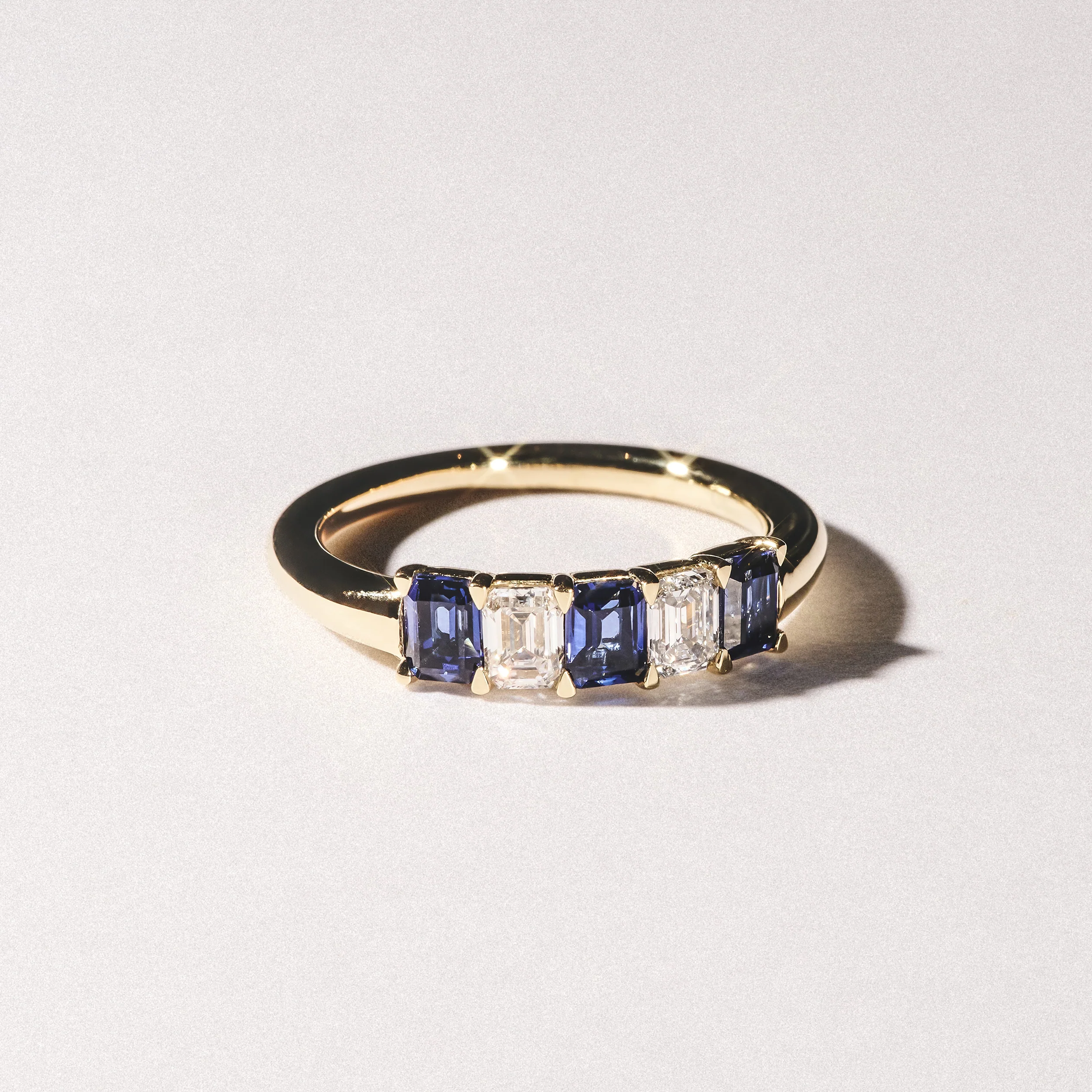 Solene 0.75ct Emerald Cut Lab Sapphire and Lab Diamond Half Band Eternity Ring in 18K Yellow Gold - Image 8
