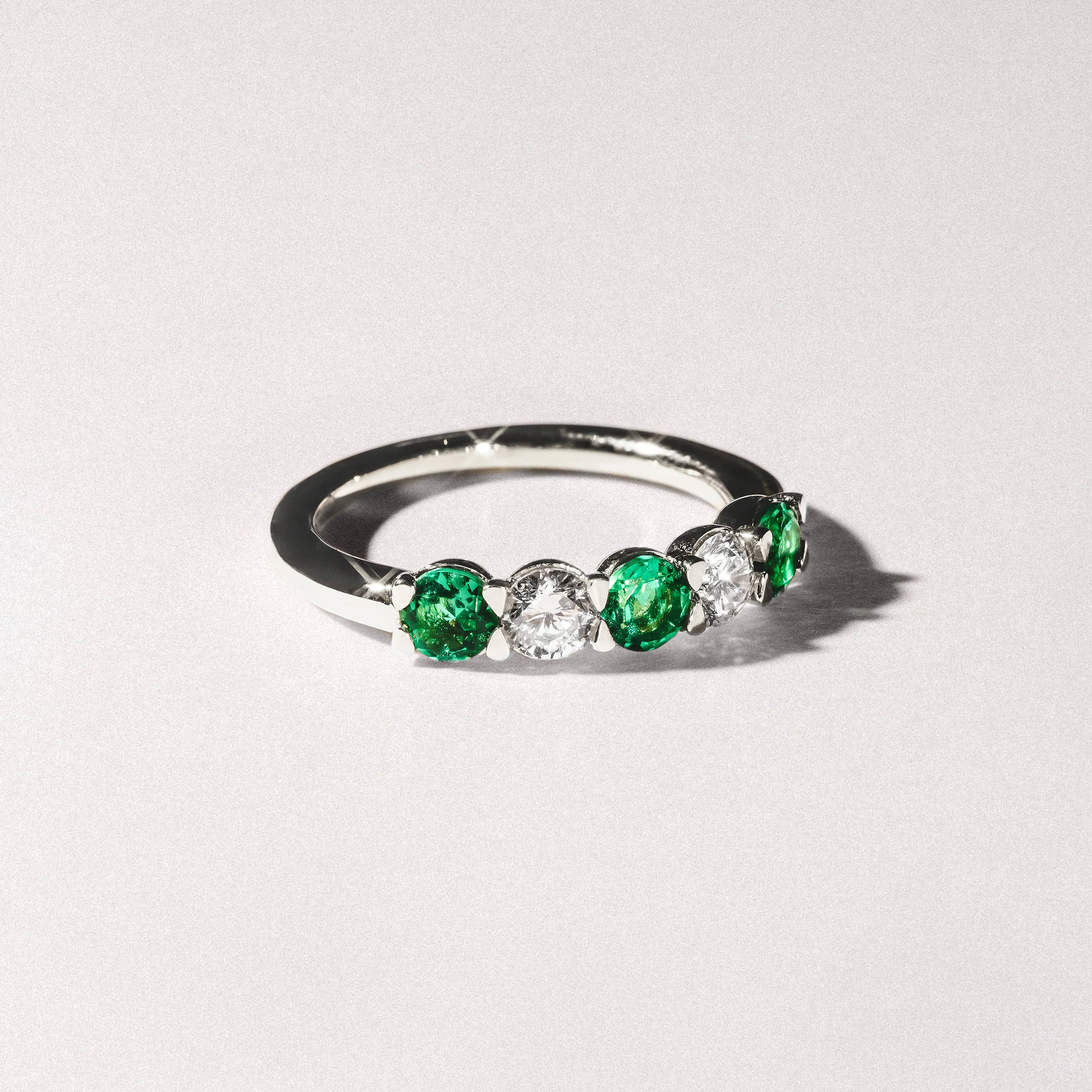 Solene 0.75ct Round Cut Lab Emerald and  Lab Diamond Half Eternity Ring in 18K White Gold - Image 8