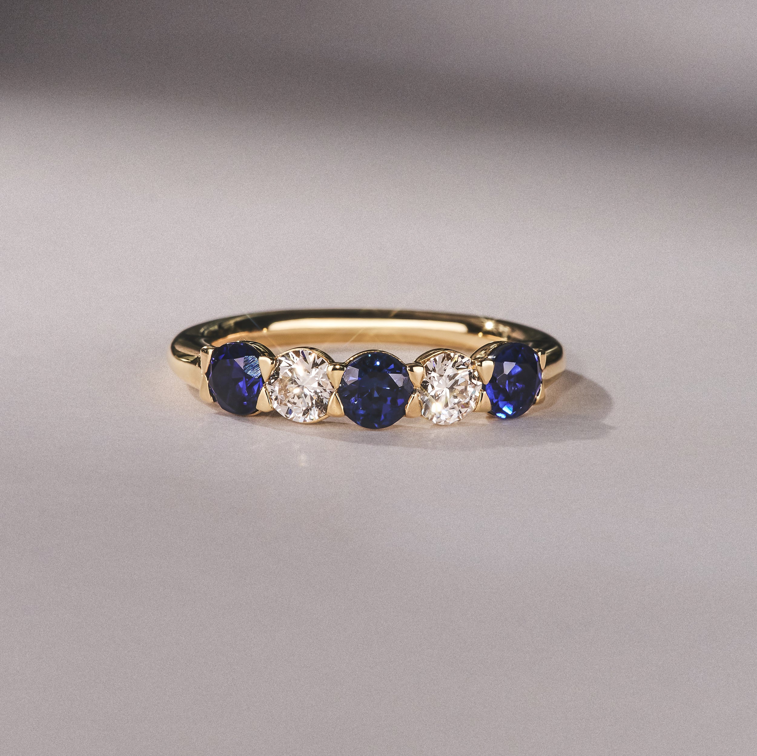 Solene 0.75ct Round Cut Lab Sapphire and Lab Diamond Half Eternity Ring in 18K Yellow Gold - Image 6