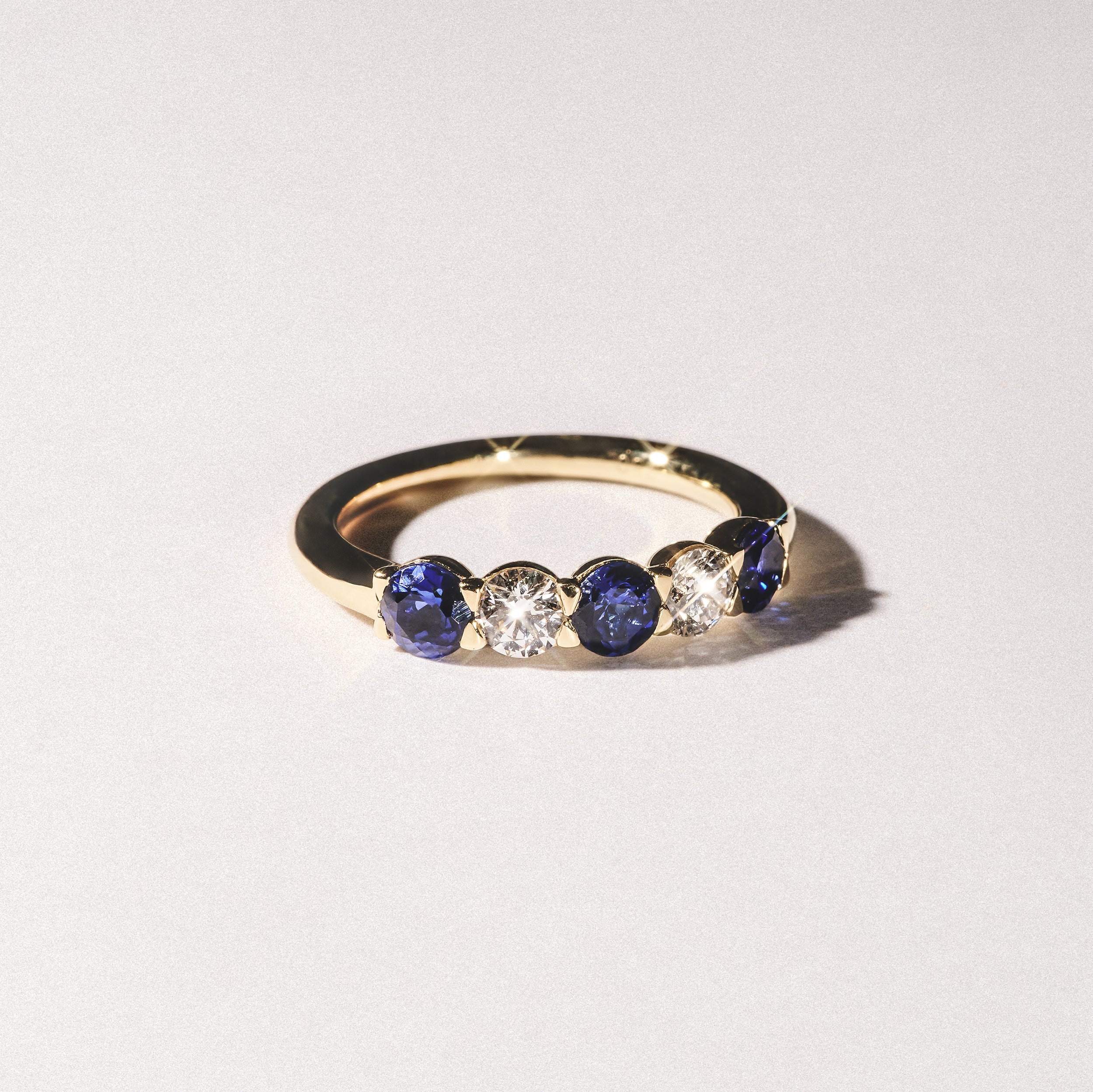 Solene 0.75ct Round Cut Lab Sapphire and Lab Diamond Half Eternity Ring in 18K Yellow Gold - Image 8